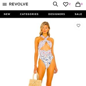 Elegant Revolve One Piece. Never worn still in packaging.